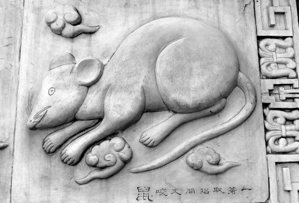 Rat symbol imprint in wall
